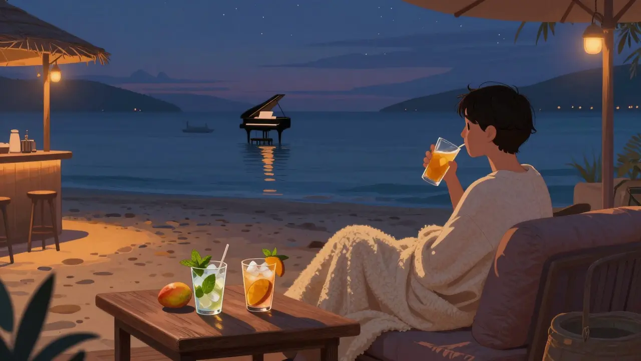 Une personne seule détendue sur un canapé en bord de mer, avec un verre et une couverture, sous un ciel étoilé et des lumières douces.